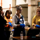 Election workers wait for voters during the Florida primary election at Doris & Phil Sanford Fire Rescue Station Coral Gables in Miami, Florida, on March 17, 2020.